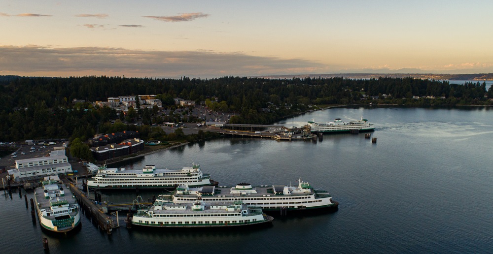 Aerial photo of ferries at Eagle Harbor after sunset.